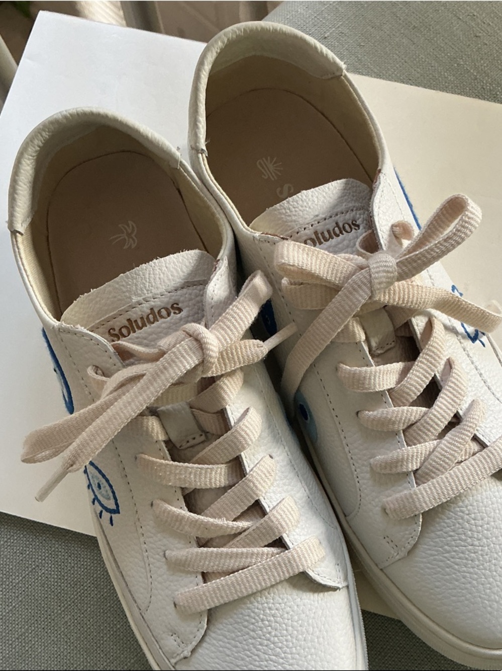 Soludos White Leather Sneakers with Blue Sun Stitching